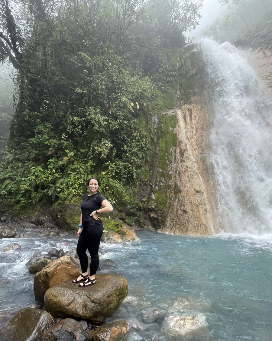 Amanda at a blue waterfall in Costa Rica