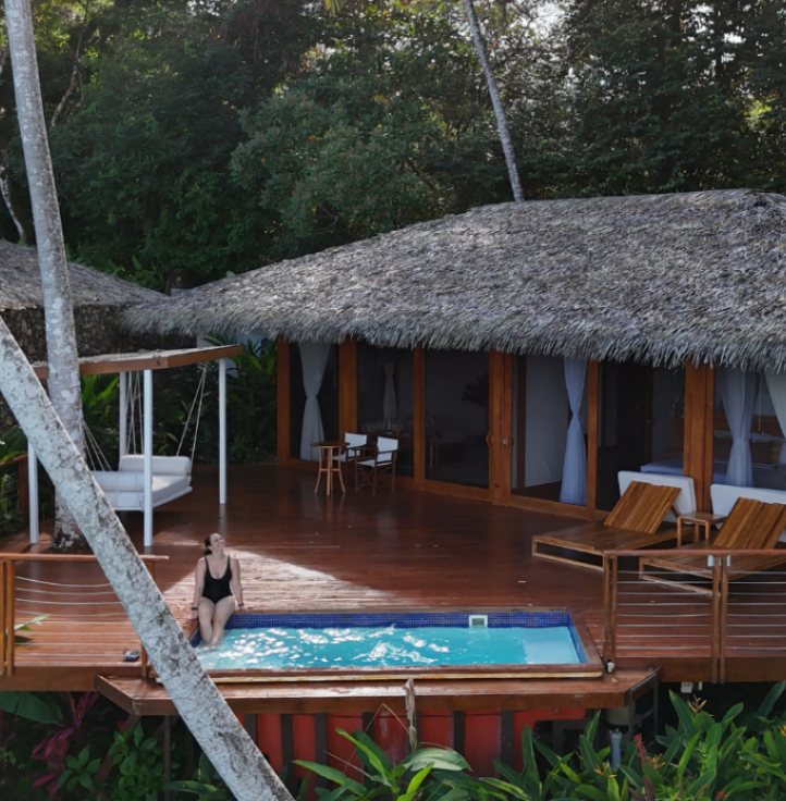Thatched villa with a private pool and deck
